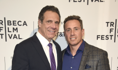 Gov. Andrew Cuomo and CNN host Chris Cuomo attend an event. (Photo credit: Kevin Mazur/Getty Images for HBO)