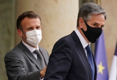 Secretary of State Antony Blinken and French President Emmanuel Macron in Paris last June. (Photo by Andrew Harnik / Pool /AFP via Getty Images)