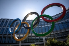 The Olympic Rings logo is pictured in front of the headquarters of the International Olympic Committee (IOC) in Lausanne. (Photo credit: FABRICE COFFRINI/AFP via Getty Images)