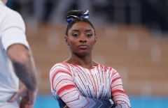 Simone Biles of Team United States reacts before the Women's Balance Beam Final. (Photo credit: Xavier Laine/Getty Images)