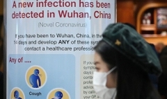 A public health warning sign in London’s Heathrow Airport on January 28, 2020. (Photo by Daniel Leal-Olivas/AFP via Getty Images)
