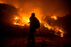 A wildfire rages in California. (Photo credit: RINGO CHIU/AFP via Getty Images)