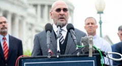 GOP Rep. Clay Higgins of Louisiana, who has introduced a resolution calling for the immediate resignation of President Biden, speaks alongside members of the House Freedom Caucus on Capitol Hill on Tuesday.  (Photo by Saul Loeb/AFP via Getty Images)