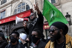 Members of the Black African Defence League protest near the U.S. Embassy in June 2020. (Photo by Anne-Christine Poujoulat/AFP via Getty Images)