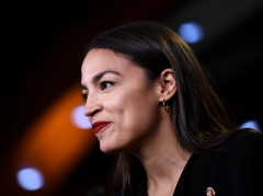 Rep. Alexandria Ocasio-Cortez (D-NY) speaks during a press conference, to address remarks made by President Donald Trump earlier in the day. (Photo credit: BRENDAN SMIALOWSKI/AFP via Getty Images)