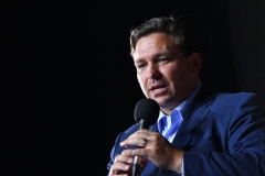 Florida Governor Ron DeSantis speaks during a campaign rally for the US president at Pensacola International Airport in Pensacola, Florida on October 23, 2020. (Photo by MANDEL NGAN/AFP via Getty Images)