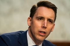 Sen. Josh Hawley (R-MO) speaks as Judge Merrick Garland testifies before a Senate Judiciary Committee hearing on his nomination to be U.S. Attorney General. (Photo credit: DEMETRIUS FREEMAN/The Washington Post/AFP via Getty Images)