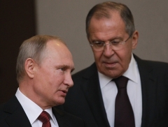 Russian President Vladimir Putin and Foreign Minister Sergei Lavrov. (Photo by Mikhail Svetlov/Getty Images)