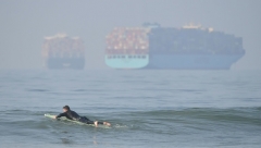 Container ships wait off Huntington Beach, Calif. in September. (Photo by FREDERIC J. BROWN/AFP via Getty Images)