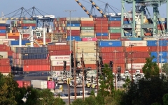 Stacks of containers await processing at the Port of Los Angeles on September 28, 2021. A record number of cargo ships are stuck floating and waiting off the southern California coast amid a supply chain crisis which could mean fewer gifts and toys for Christmas this year as a combination of growing volumes of cargo, Covid-related saftey measures and a labor shortage slow the handling and processing of cargo from each ship. (Photo by FREDERIC J. BROWN/AFP via Getty Images)