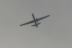 A drone flies over the airport in Kabul on August 31, 2021, the day the U.S. military engagement ended.  (Photo by Aamir Qureshi/AFP via Getty Images)