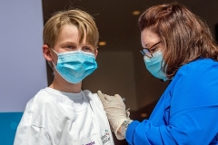 A 13-year-old gets his COVID shot in Hartford, Conn. in May 2021. The FDA is meeting today to vote on Pfizer vaccination for children ages 5-11. (Photo by JOSEPH PREZIOSO/AFP via Getty Images)