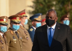 Defense Secretary Lloyd Austin reviews a military honour guard during an official welcoming ceremony at the Romanian Defence Ministry's headquarters in Bucharest, Romania, on October 20, 2021. (Photo by DANIEL MIHAILESCU/AFP via Getty Images)