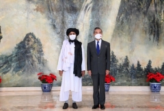 Chinese Foreign Minister Wang Yi meets with Taliban delegation head Abdul Ghani Baradar last July. (Photo: Chinese Foreign Ministry)