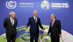 President Biden with British Prime Minister Boris Johnson and U.N. secretary-general Antonio Guterres at the conference in Glasgow on Monday. (Photo by Christopher Furlong /Pool /AFP via Getty Images)