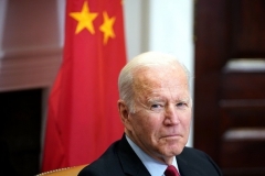 President Biden holds a virtual meeting with Chinese President Xi Jinping, from the Roosevelt Room of the White House on Monday night. (Photo by Mandel Ngan/AFP via Getty Images)