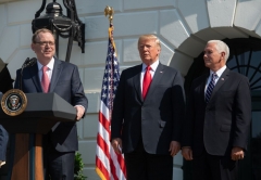 Kevin Hassett, Chair of the Council of Economic Advisers, speaks about the economy as US President Donald Trump (C) and Vice President Mike Pence (R) look on at the White House in Washington, DC, on July 27, 2018. (Photo by NICHOLAS KAMM/AFP via Getty Images)