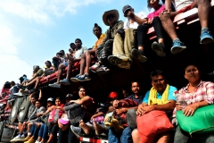 Migrants who where heading in a caravan to the US, travel in a truck in Nuevo Morelos, Jesus Carranza municipality, Veracruz state, Mexico, on November 17, 2021. - The migrants whom are seeking refugee status are marching towards the Mexican capital, demanding "justice, dignity and freedom." (Photo by CLAUDIO CRUZ/AFP via Getty Images)