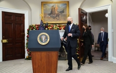 President Joe Biden, Vice President Kamala Harris, and Chief Medical Advisor to the president Anthony Fauci arrive for a briefing on the Covid-19 Omicron variant in the Roosevelt Room of the White House in Washington, DC on November 29, 2021. (Photo by MANDEL NGAN/AFP via Getty Images)