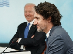 Joe Biden and Justin Trudeau sit at the G7 summit earlier in 2021. (Photo credit: KEVIN LAMARQUE/POOL/AFP via Getty Images)