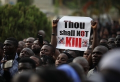 Nigerian Christians hold a prayer rally in Abuja for peace in their country and to denounce the killing of Christians by Islamist insurgents and kidnappings for ransom. (Photo by Kola Sulaimon/AFP via Getty Images)