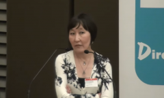 Saule Omarova gives a speech. (Photo credit: YouTube/Agence2Presse Groupe EDH™ Communication)