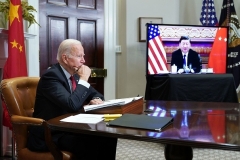 President Biden holds a virtual meeting with Chinese President Xi Jinping, from the Roosevelt Room of the White House on Monday night. (Photo by Mandel Ngan/AFP via Getty Images)