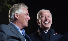 President Joe Biden and Virginia Democrat gubernatorial candidate Terry McAuliffe conjured Donald Trump on the campaign trail in Arlington, Virginia on October 26, 2021. (Photo by NICHOLAS KAMM/AFP via Getty Images)