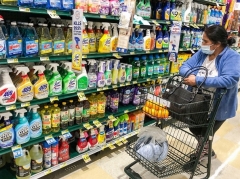 A shopper faces higher grocery prices in Arlington, Virginia on November 10, 2021. (Photo by ANDREW CABALLERO-REYNOLDS/AFP via Getty Images)