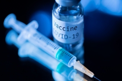 Numerous employers have started requiring employees receive a COVID-19 vaccine. (Photo credit: JOEL SAGET/AFP via Getty Images)