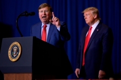 Mississippi Gov. Tate Reeves and former President Donald Trump  (Photo by JIM WATSON/AFP via Getty Images)