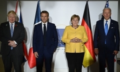 President Biden meets in Rome last October with the leaders of the three European nations involved in the Iran nuclear talks, British Prime Minister Boris Johnson, French President Emmanuel Macron and then-German Chancellor Angela Merkel. (Photo by Brendan Smialowski/AFP via Getty Images)