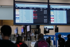 An electronic flight notice board displaying at Johannesburg’s international airport notifies passangers of canceled flights after a number of countries banned flights from South Africa over the discovery of a new omicron variant. (Photo by Phill Magakoe/AFP via Getty Images)