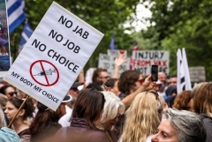 A protest against COVID-19 vaccine mandates and lockdowns in Sydney, Australia last month. (Photo by David Gray/AFP via Getty Images)