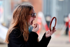 A women tests herself for coronavirus.  (Photo by TOLGA AKMEN/AFP via Getty Images)