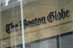Featured is the outside of the Boston Globe's office. (Photo credit: JOSEPH PREZIOSO/AFP via Getty Images)