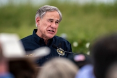 Texas Governor Greg Abbott speaks during a visit to the border wall near Pharr, Texas on June 30, 2021. - Former President Donald Trump visited the area with Texas Gov. Greg Abbott to address the surge of unauthorized border crossings that they blame on the Biden administration's change in policies. (Photo by SERGIO FLORES/AFP via Getty Images)