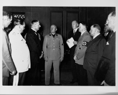 Neville Chamberlain, Adolph Hitler, Benito Mussolini, and Hermann Goering stand together at the Munich Conference in 1938. (Photo credit: Library of Congress/Corbis/VCG via Getty Images)