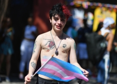 A child who identifies as transgender participates in a protest. (Photo credit: ANGELA WEISS/AFP via Getty Images)