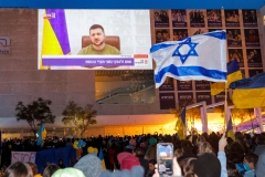 Demonstrators gather at Habima Square in the centre of Israel's Mediterranean coastal city of Tel Aviv on March 20, 2022 to attend a televised video address by Ukraine's President Volodymyr Zelensky. (Photo by JACK GUEZ/AFP via Getty Images)