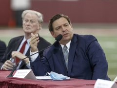 Florida Gov. Ron DeSantis speaks during a collegiate athletics roundtable about fall sports at the Albert J. Dunlap Athletic Training Facility on the campus of Florida State University. (Photo credit: Don Juan Moore/Getty Images)