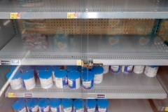 Grocery store shelves where baby formula is typically stocked are locked and nearly empty in Washington, DC, on May 11, 2022. (Photo by STEFANI REYNOLDS/AFP via Getty Images)