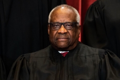 Associate Justice Clarence Thomas sits during a group photo of the Justices at the Supreme Court in Washington, DC on April 23, 2021. (Photo by ERIN SCHAFF/POOL/AFP via Getty Images)