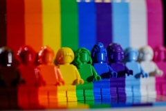 This picture taken on June 3, 2021 shows Danish toy brick maker Lego's "Everyone is Awesome" new set of rainbow-coloured figurines to celebrate the diversity of its fans and the LGBTQI+ community. / AFP PHOTO / Thomas SAMSON - The new 346-piece set will went on sale on June 1 to coincide with Pride Month, which is dedicated to celebrating the LGBTQI+ communities around the world. (Photo by THOMAS SAMSON/AFP via Getty Images)