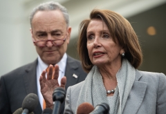 House Speaker Nancy Pelosi (D-CA) and Senate Majority Leader Chuck Schumer (D-NY) give an address. (Photo credit: SAUL LOEB/AFP via Getty Images)