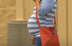 A pregnant woman walks. (Photo credit: YouTube/WFAA)