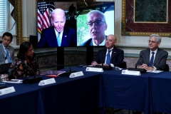 (L-R) Susan Rice, Assistant to the President and Domestic Policy Advisor, US President Joe Biden (on left of monitor), US Homeland Security Secretary Alejandro Mayorkas, and US Attorney General Merrick Garland listen. (Photo by MANDEL NGAN/AFP via Getty Images)