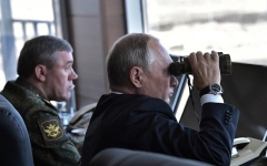 President Vladimir Putin and chief of the Russian general staff Gen. Valery Gerasimov observe the Vostok 2018 military drills in Siberia. (Photo by Alexey Nikolsky/AFP ia Getty Images)