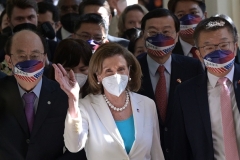 Visiting US House Speaker Nancy Pelosi waves to journalists at the parliament in Taipei on August 3, 2022. (Photo by SAM YEH/AFP via Getty Images)