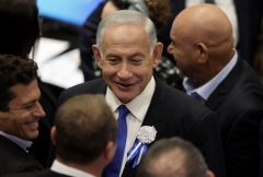 Incoming Israeli Prime Minister Benjamin Netanyahu (C) arrives for the swearing in ceremony of the new Israeli government at the Knesset (Israeli parliament) in Jerusalem, on November 15, 2022.(Photo by ABIR SULTAN/POOL/AFP via Getty Images) Incoming Israeli Prime Minister Benjamin Netanyahu (C) arrives for the swearing in ceremony of the new Israeli government at the Knesset (Israeli parliament) in Jerusalem, on November 15, 2022.(Photo by ABIR SULTAN/POOL/AFP via Getty Images)